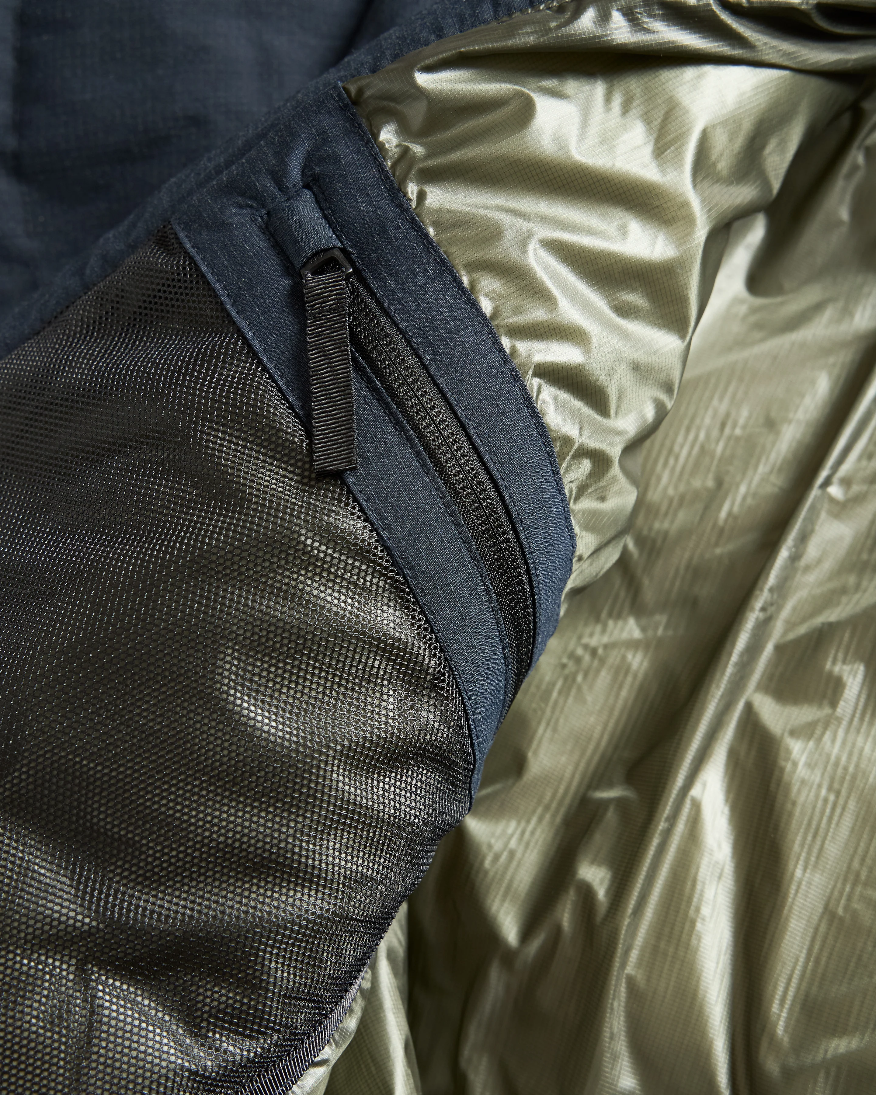 18 EAST / NANGA HOODED LOOKOUT DOWN JACKET - NAVY MELANGE HINOC / OD GREEN 15DN RIPSTOP NYLON - Image 10