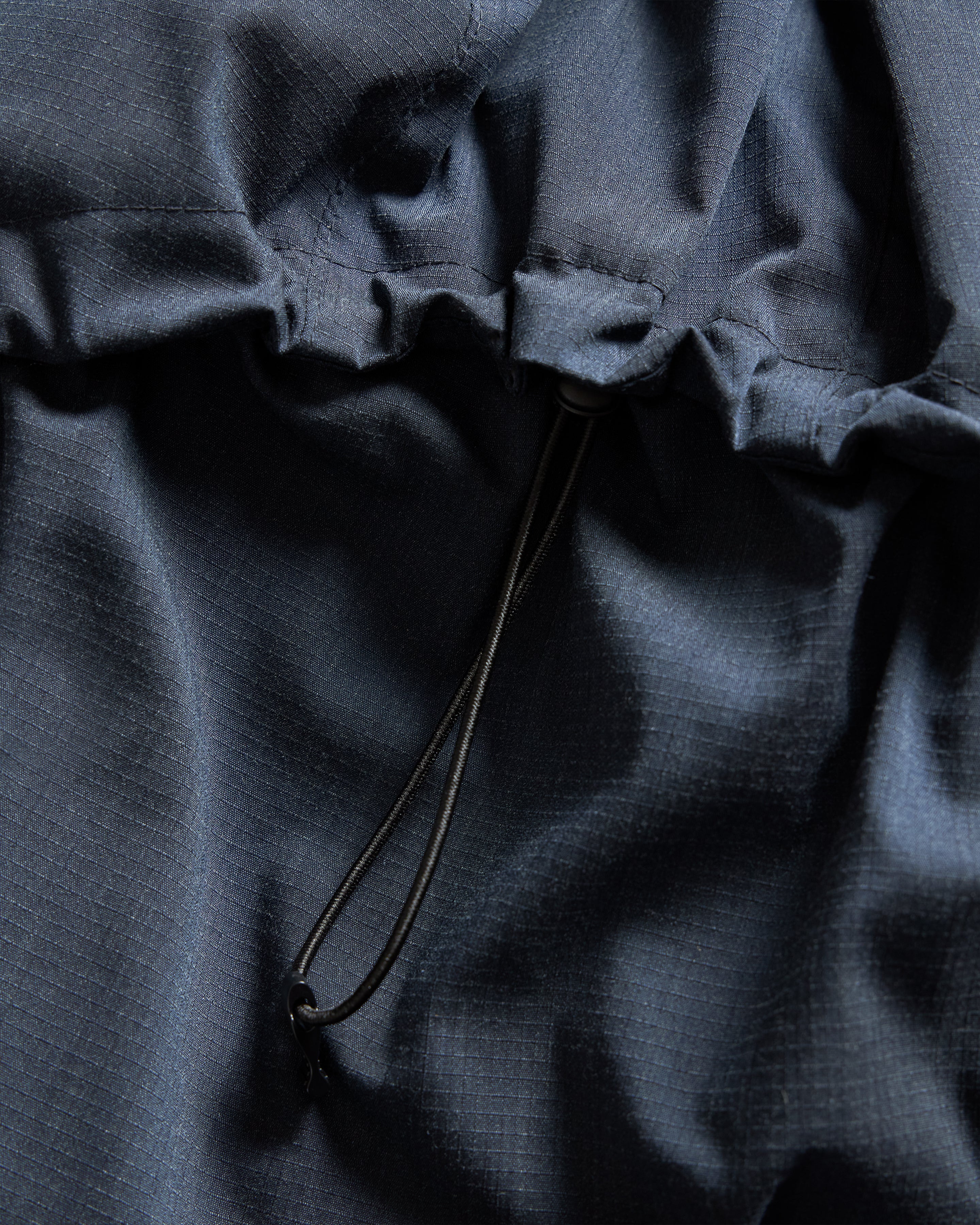 18 EAST / NANGA HOODED LOOKOUT DOWN JACKET - NAVY MELANGE HINOC / OD GREEN 15DN RIPSTOP NYLON - Image 11