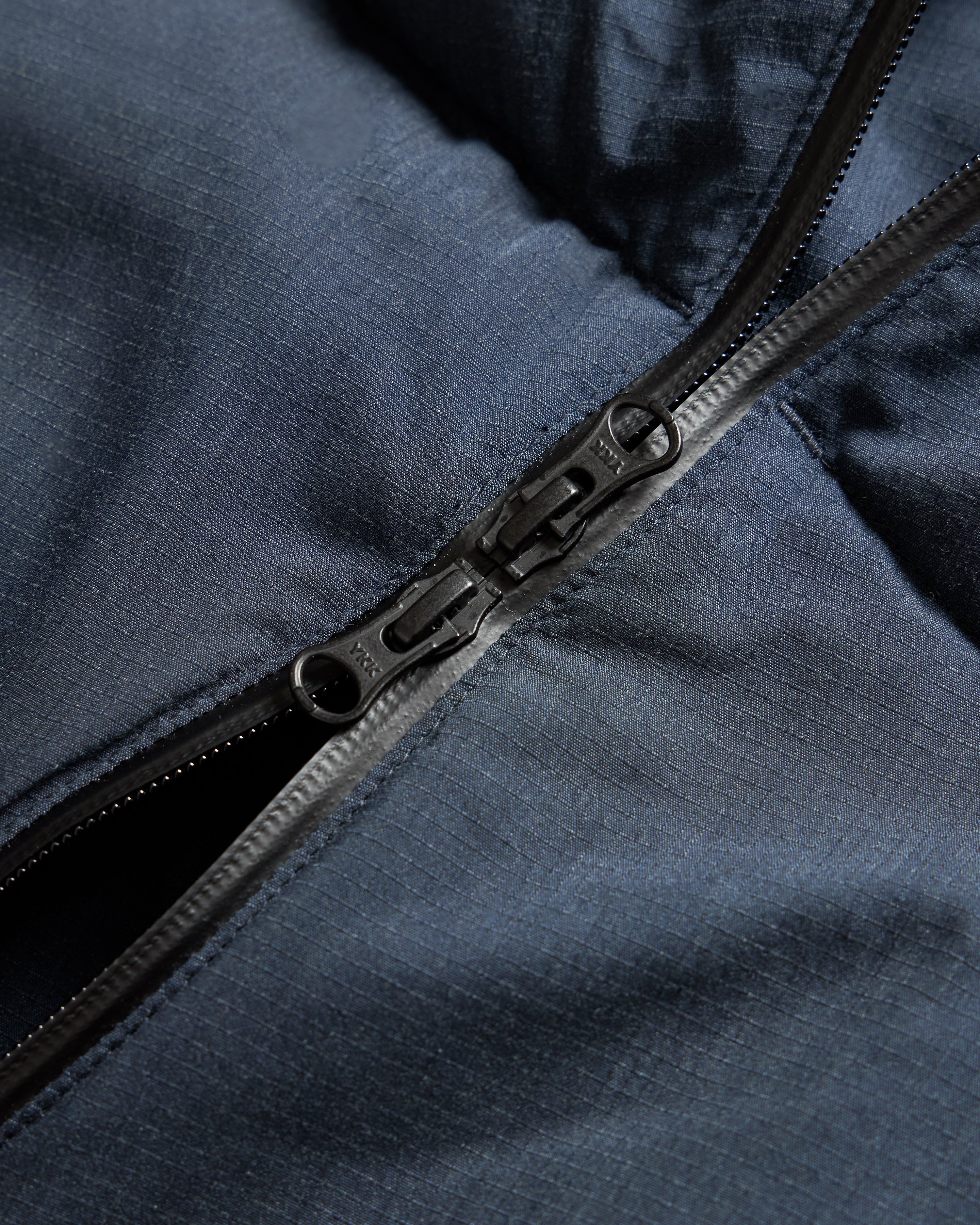 18 EAST / NANGA HOODED LOOKOUT DOWN JACKET - NAVY MELANGE HINOC / OD GREEN 15DN RIPSTOP NYLON - Image 12