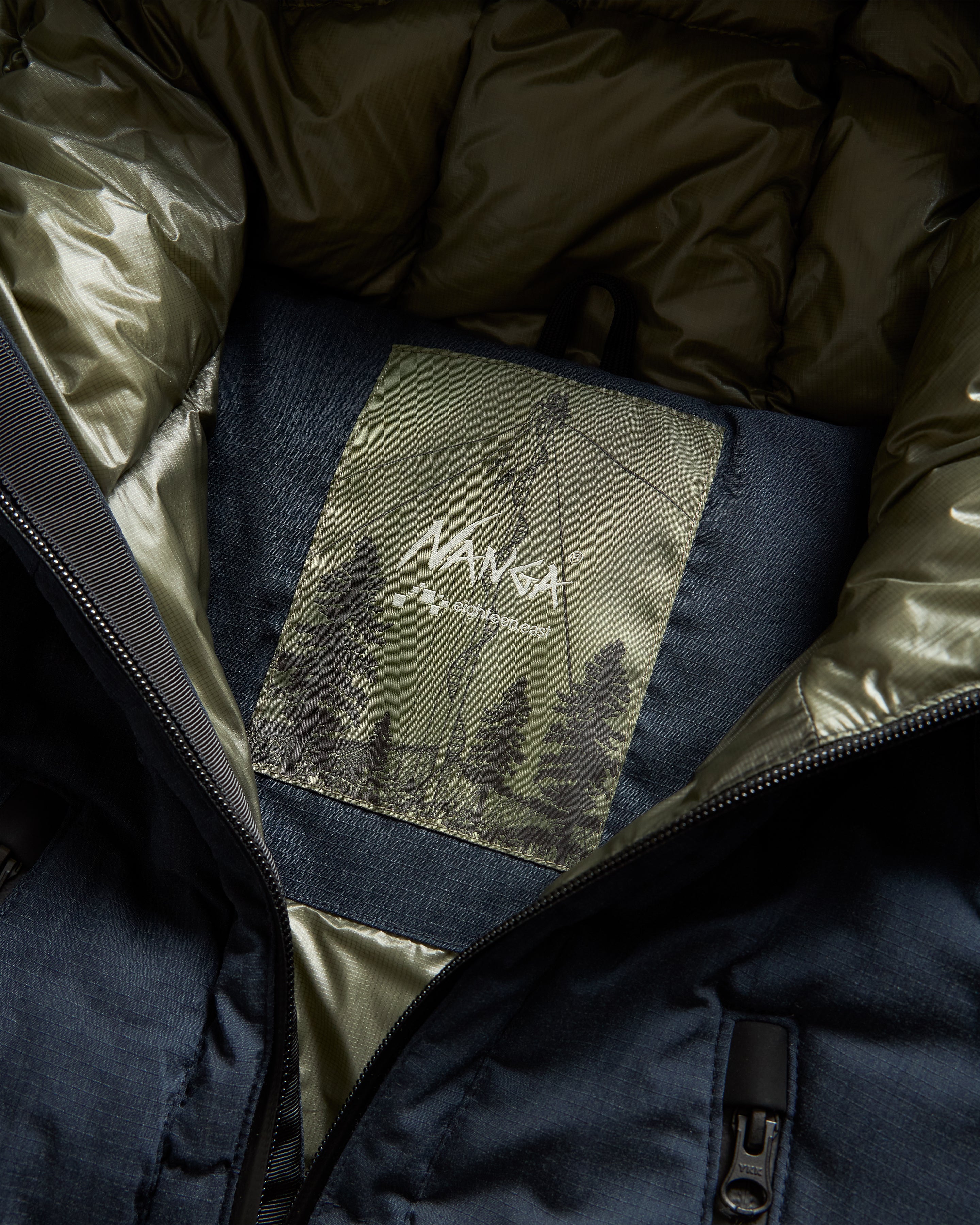 18 EAST / NANGA HOODED LOOKOUT DOWN JACKET - NAVY MELANGE HINOC / OD GREEN 15DN RIPSTOP NYLON - Image 6