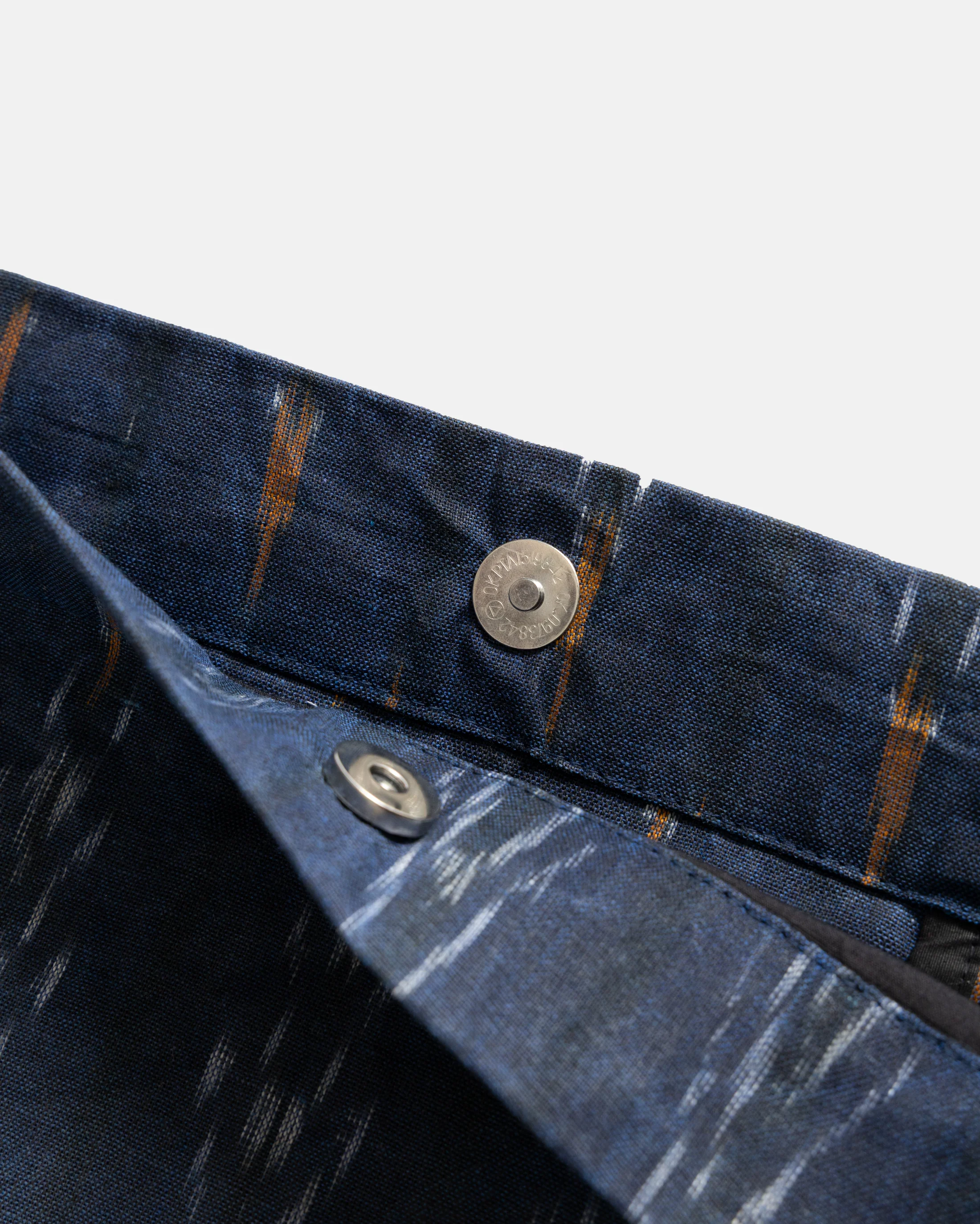 CONVERTIBLE CARRY-ALL SLING - MIDNIGHT / ECRU / ORANGE BEESWAX COATED HANDWOVEN COTTON IKAT - Image 6